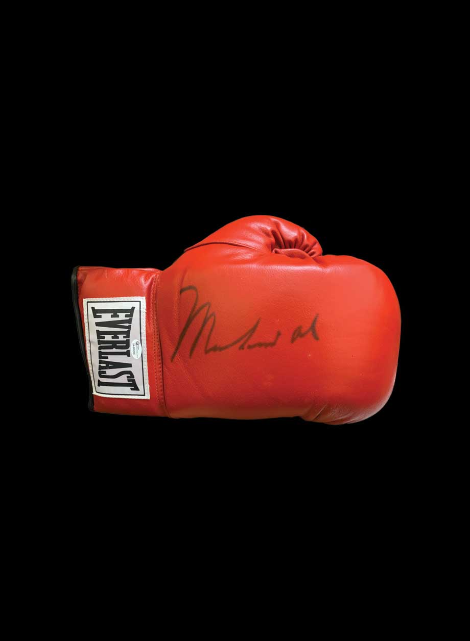 Muhammad Ali signed boxing glove - Unframed + PS0.00
