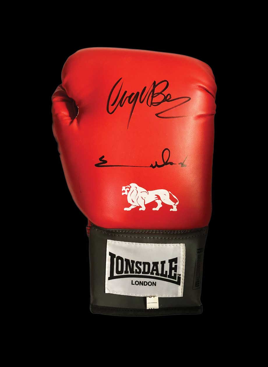Nigel Benn & Chris Eubank signed boxing glove - Unframed + PS0.00