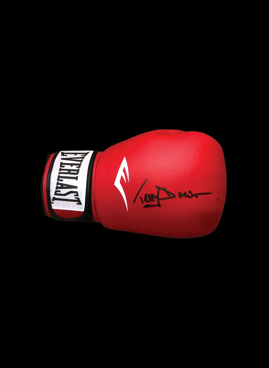 Terry Downes signed boxing glove - Unframed + PS0.00