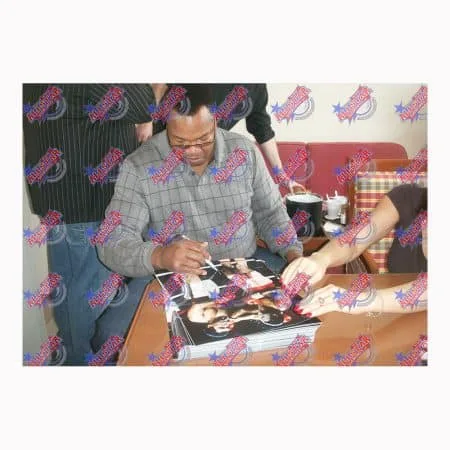 Larry Holmes signed 16×12 photo vs Muhammad Ali - All Star Signings