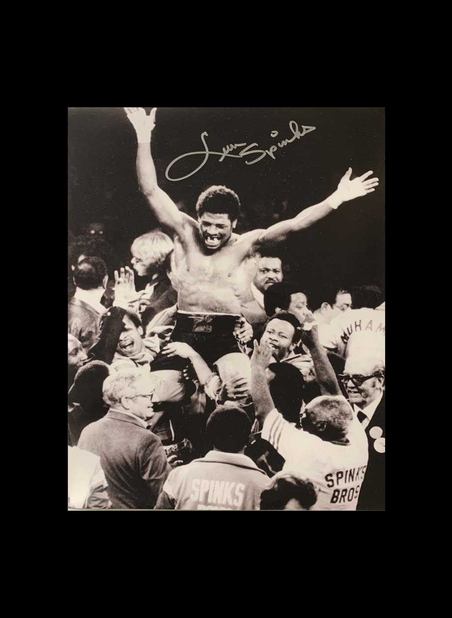 Leon Spinks signed 16x12 photo vs Muhammad Ali - Unframed + PS0.00