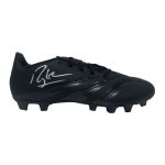 Black soccer cleat with a silver autograph on the side and glossy stripes, isolated on white background