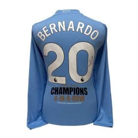 Light-blue soccer jersey back with the name 'BERNARDO' and number 20, celebrating four consecutive Premier League titles (4-in-a-row).