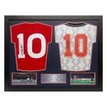 Framed display of two signed sports jerseys (both number 10) with three small photos and a caption plaque at the bottom edge.